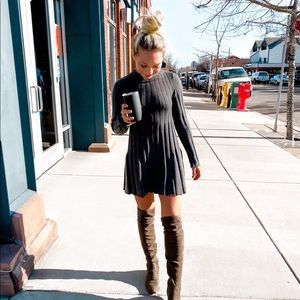 Over the knee suede boots.